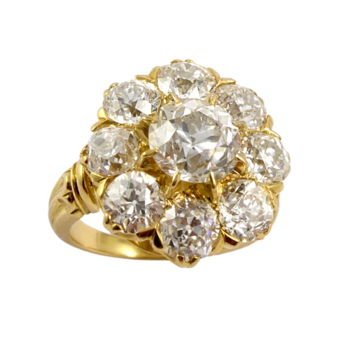 Old brilliant cut diamond cluster ring, of flowerhead form remounted in late 19th century style, the larger stone to centre of approximately 2.40ct,